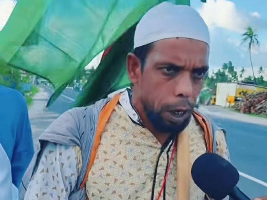 পায়ে হেঁটে হজের পথে সিংড়ার দুলাল মিয়া, ভিসার দায়িত্ব নিলেন লিটন মিয়া